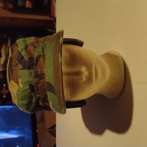 Cap, combat BDU size 7 1/4. Camouflage color. Eat& neck cover